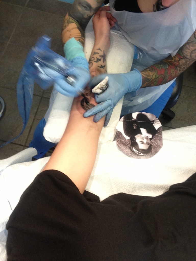 getting a tattoo