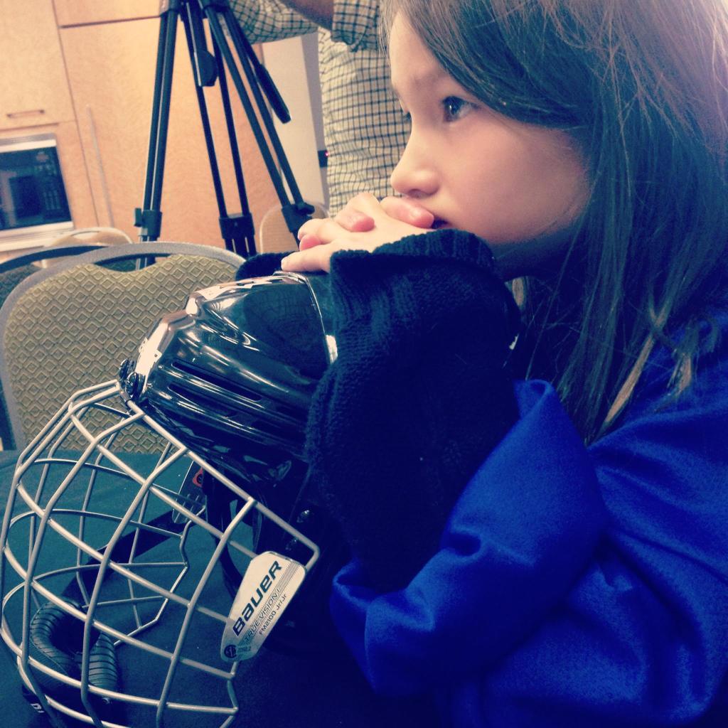 girl with hockey helmet